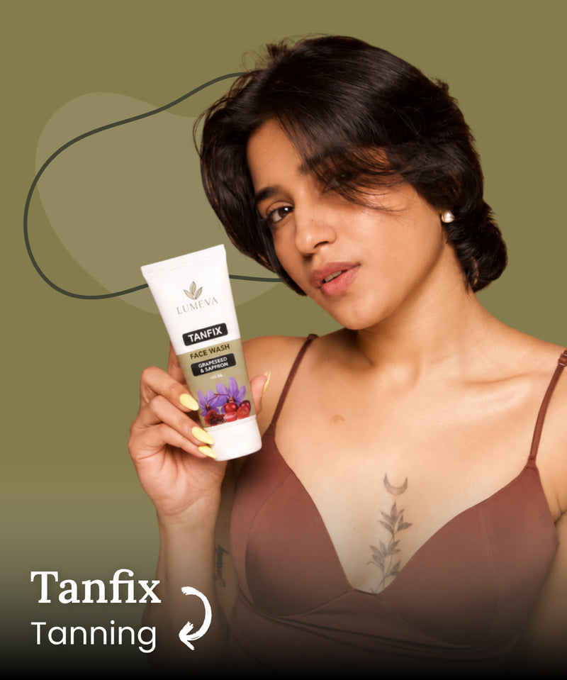 Woman holding a Tanfix tanning product against a green background