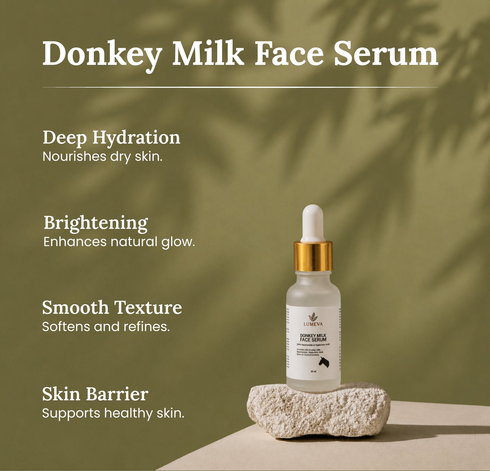 Donkey milk face serum bottle with dropper on a stone surface against a green leafy background